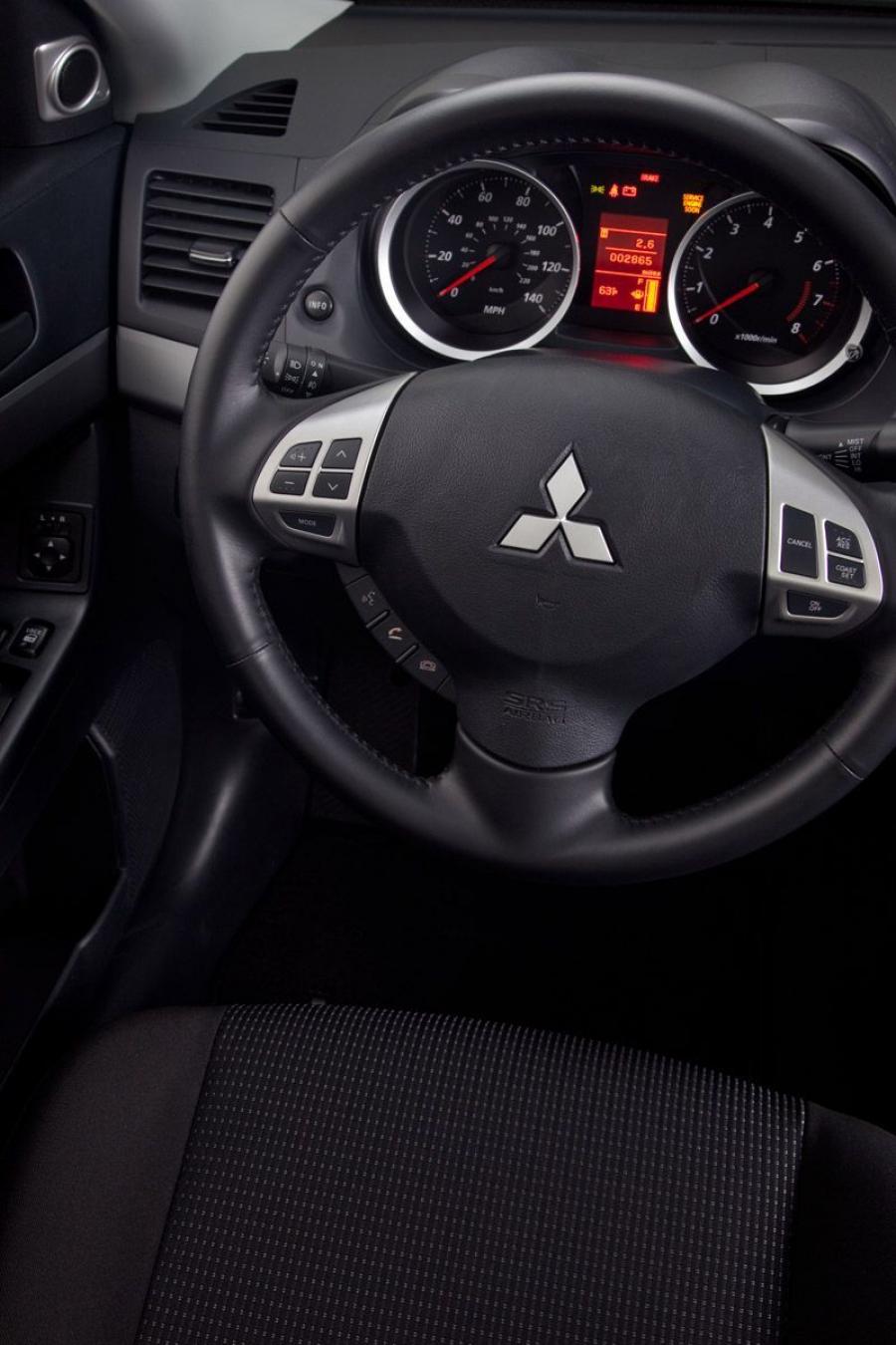  Mitsubishi Lancer ES 2010 года  (фото 22 из 24)